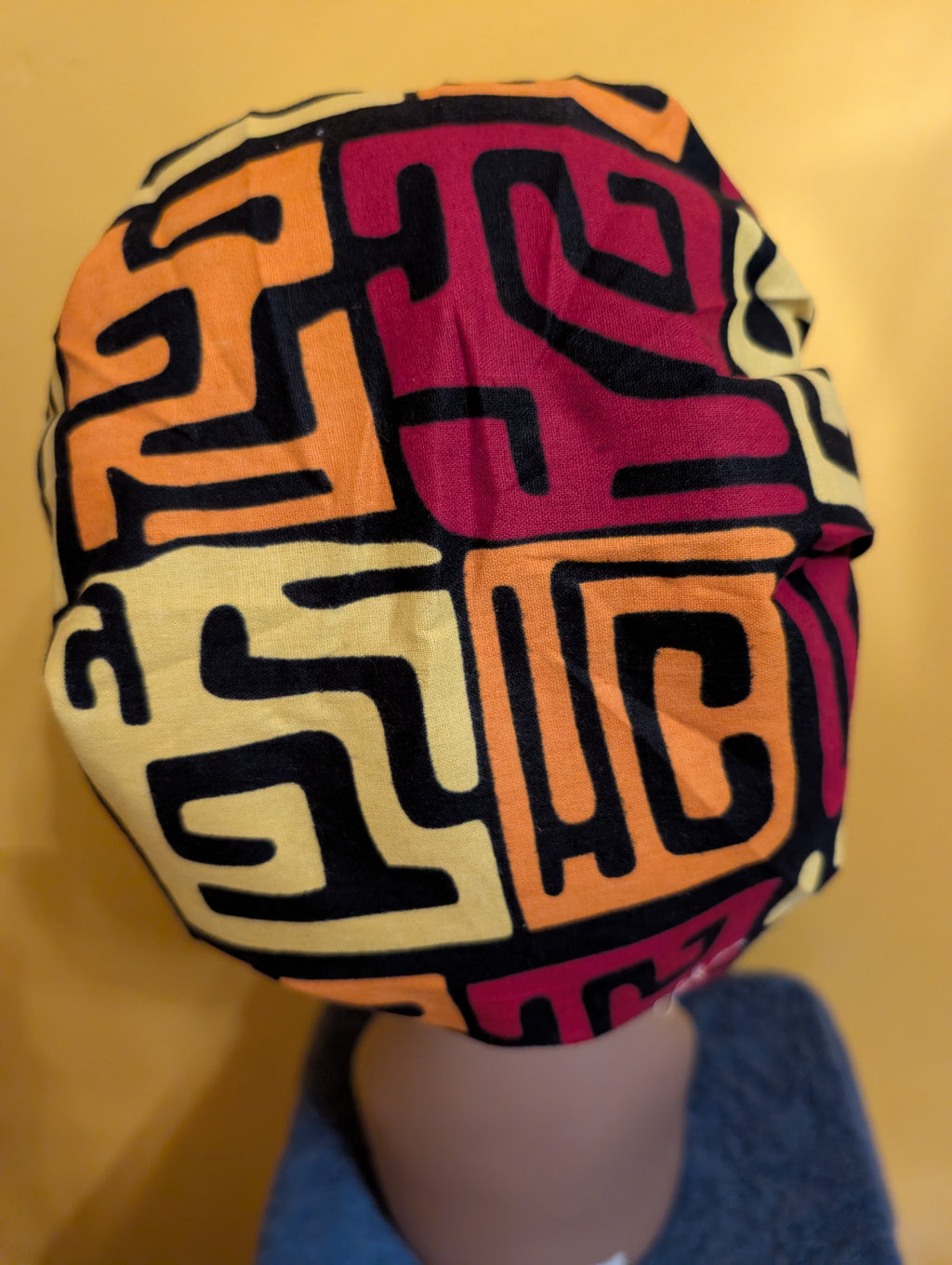 Orange/Yellow/Black Satin Lined Bouffant Style Hat